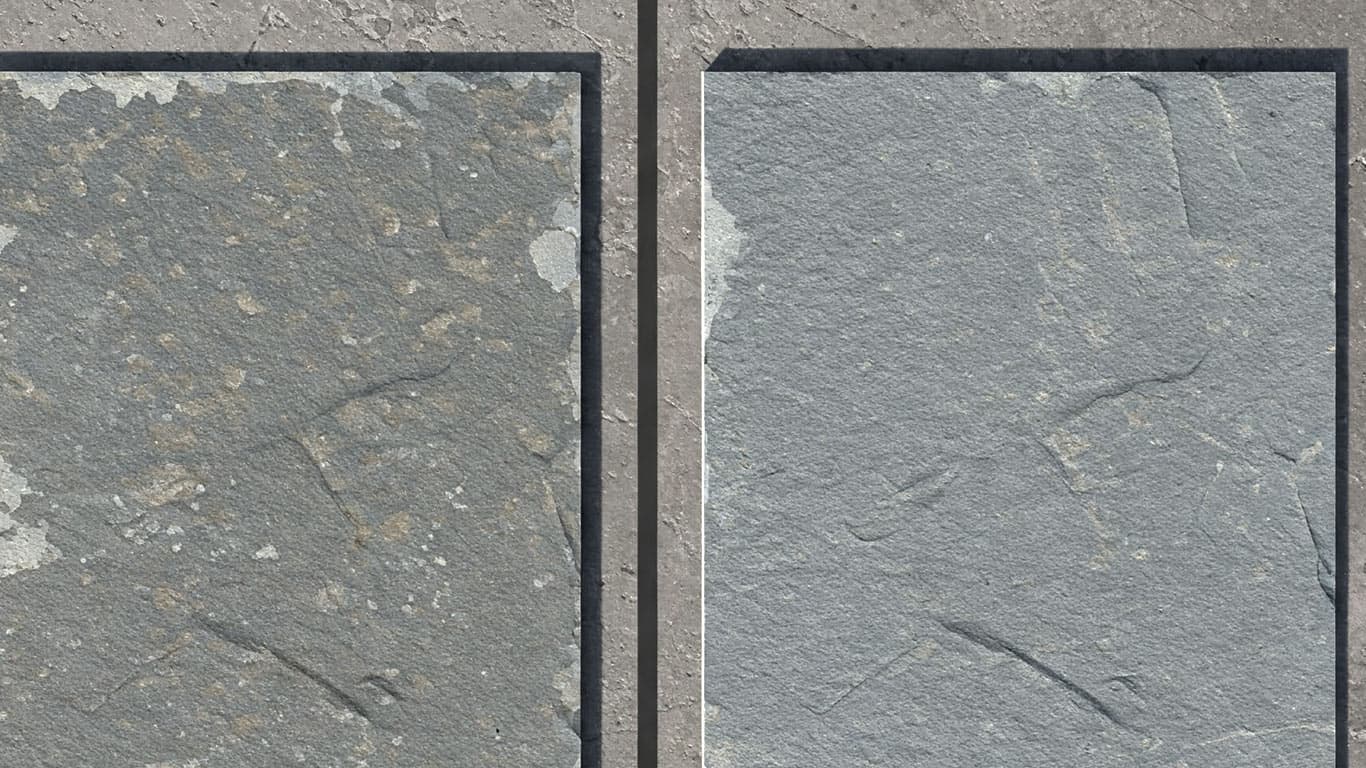 Bluestone surface undergoing laser cleaning showing precise contamination removal