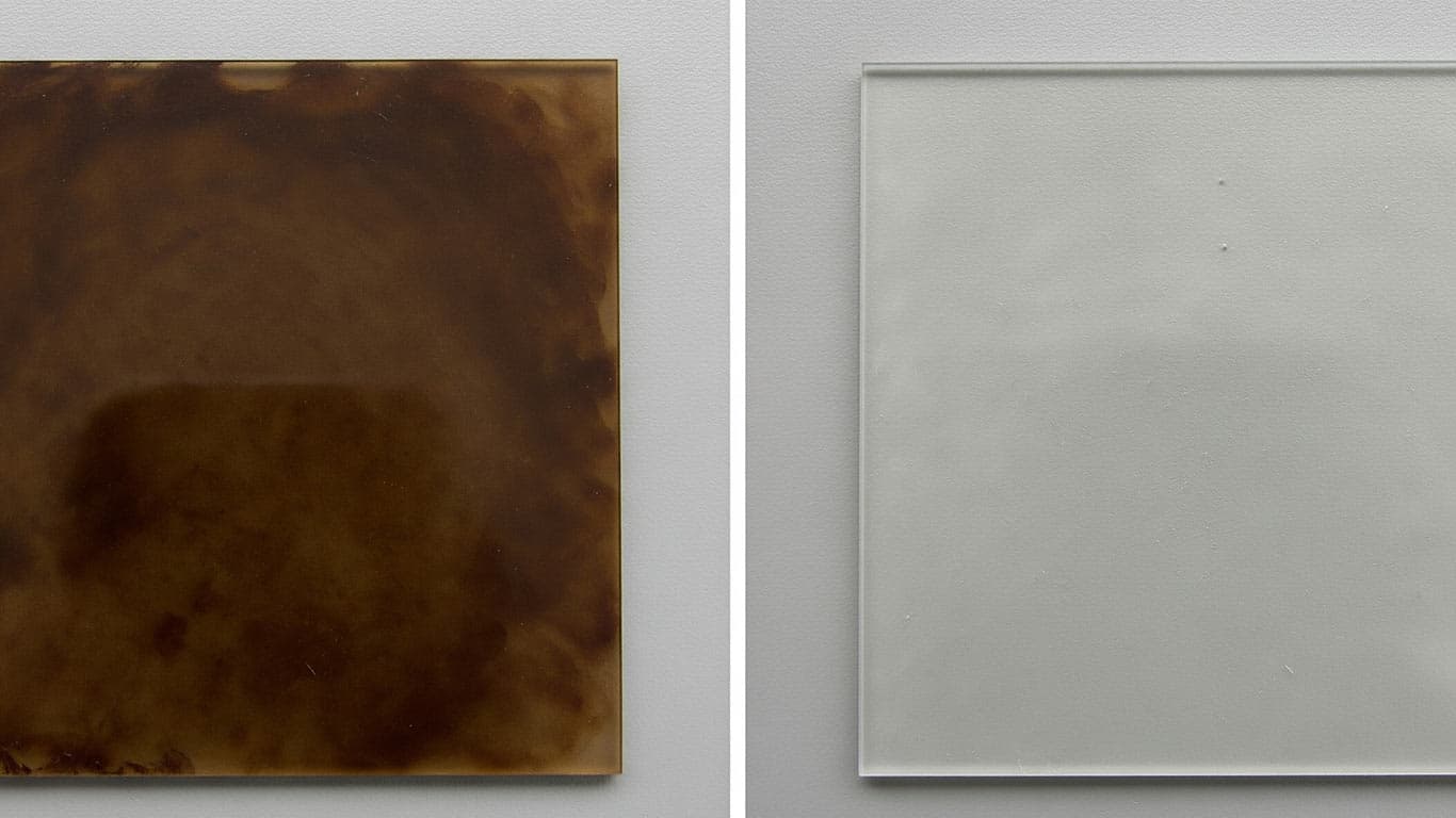 Fused Silica surface undergoing laser cleaning showing precise contamination removal