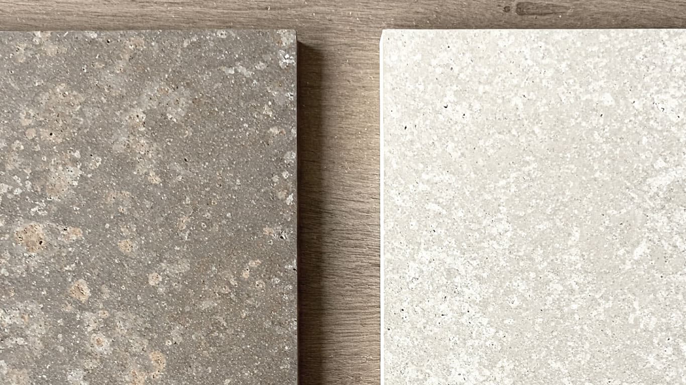 Porphyry surface undergoing laser cleaning showing precise contamination removal