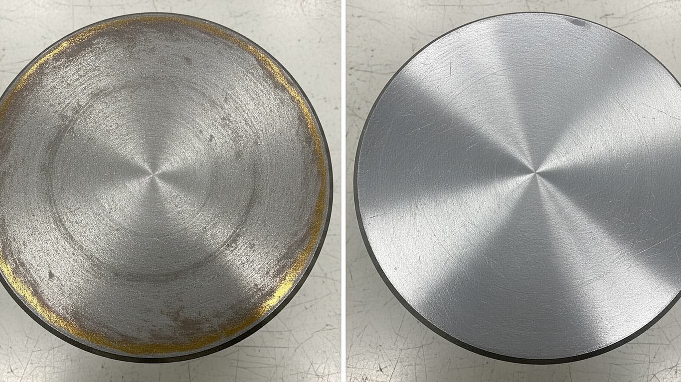 Vanadium surface undergoing laser cleaning showing precise contamination removal