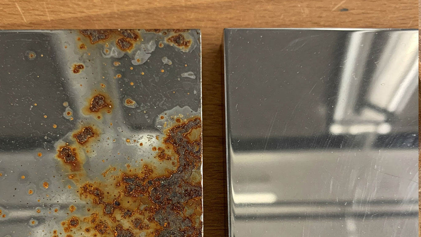 Chromium surface undergoing laser cleaning showing precise contamination removal