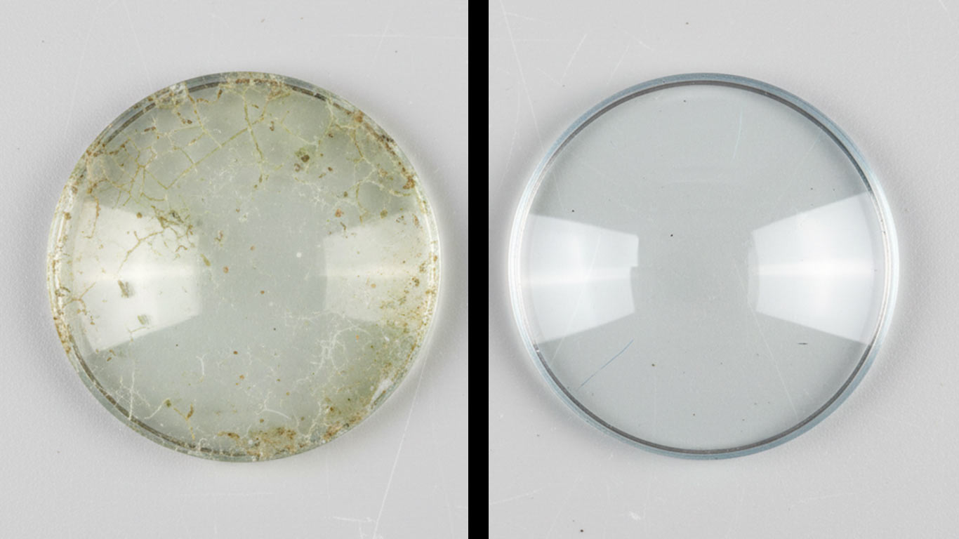 Crown Glass surface undergoing laser cleaning showing precise contamination removal