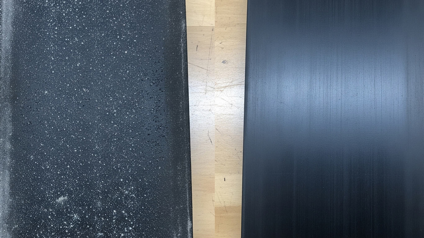 Rubber surface undergoing laser cleaning showing precise contamination removal