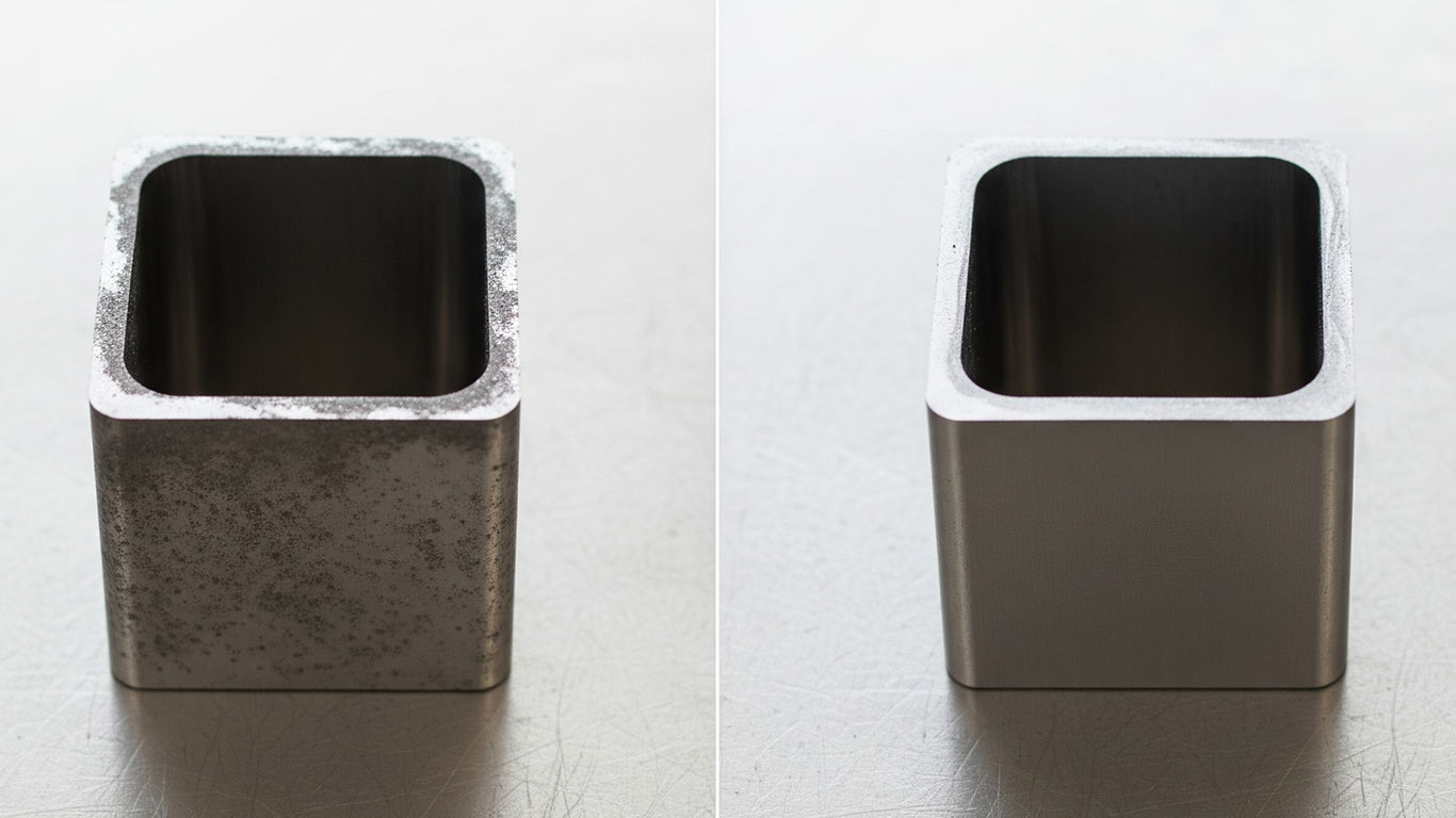 Tantalum surface undergoing laser cleaning showing precise contamination removal